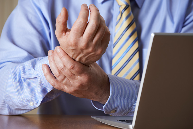 Businessman Suffering From Repetitive Strain Injury (rsi)